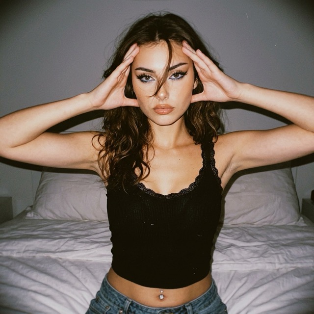 A sensual portrait in jeans and a lace top